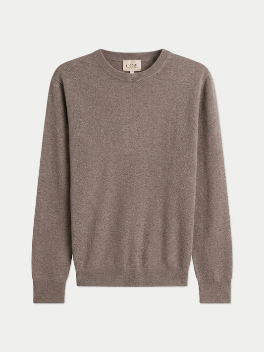 Vue de face d'un pull ras du cou couleur taupe sur fond gris clair. #color_taupe