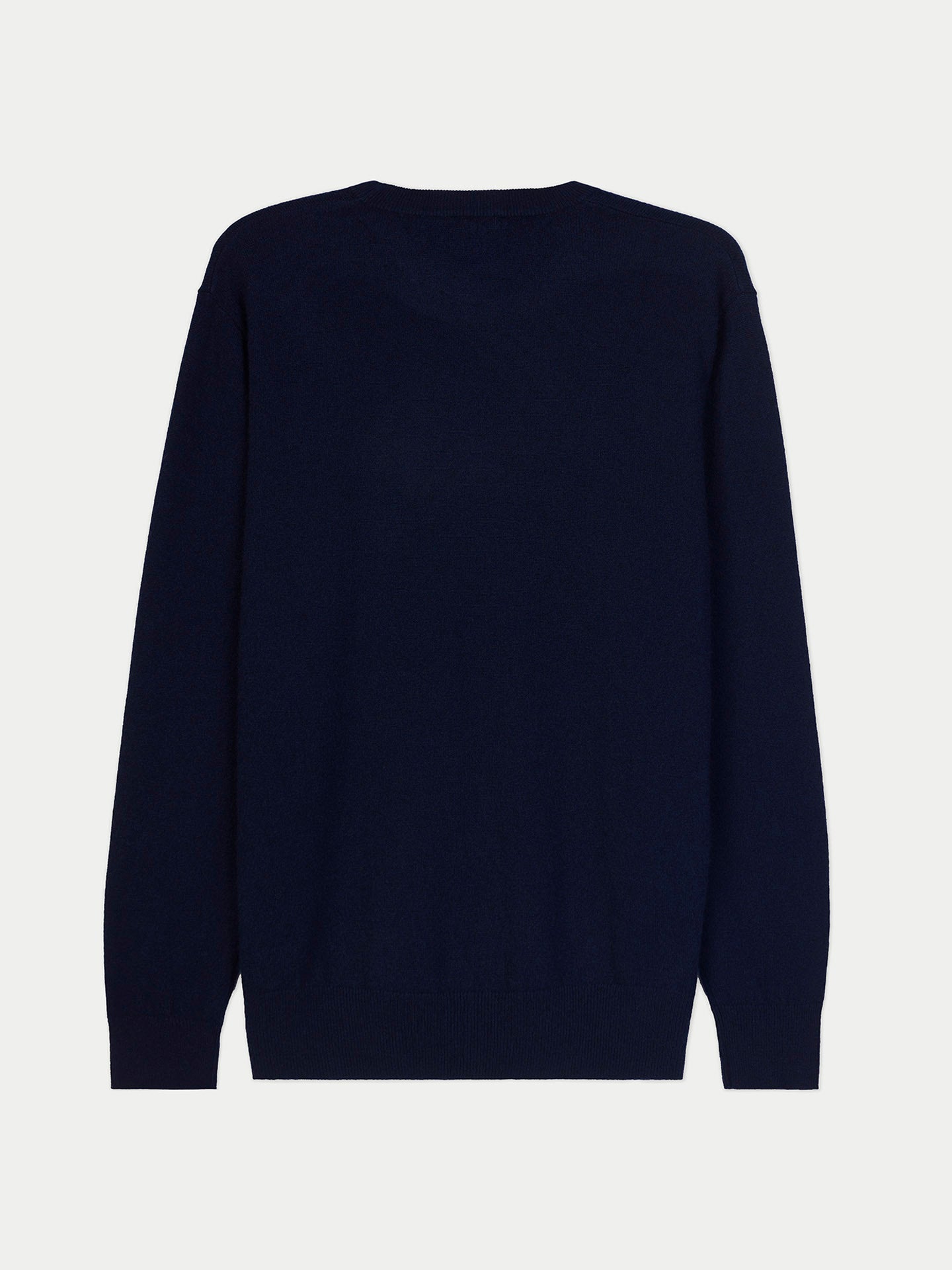 Vue de dos d'un pull bleu marine sur fond gris clair #color_navy