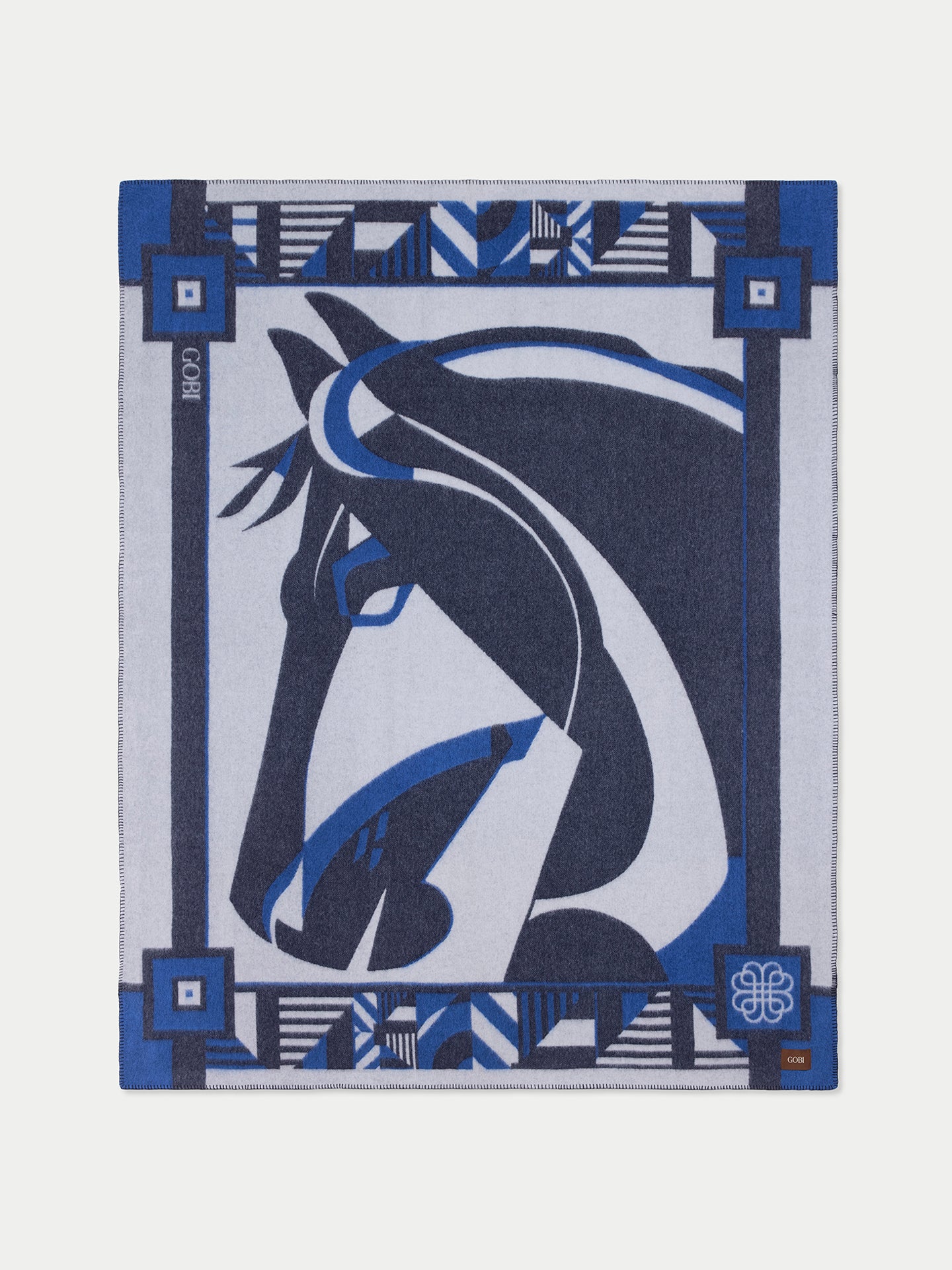 Coussin décoratif à motif de cheval et à motifs géométriques sur fond blanc