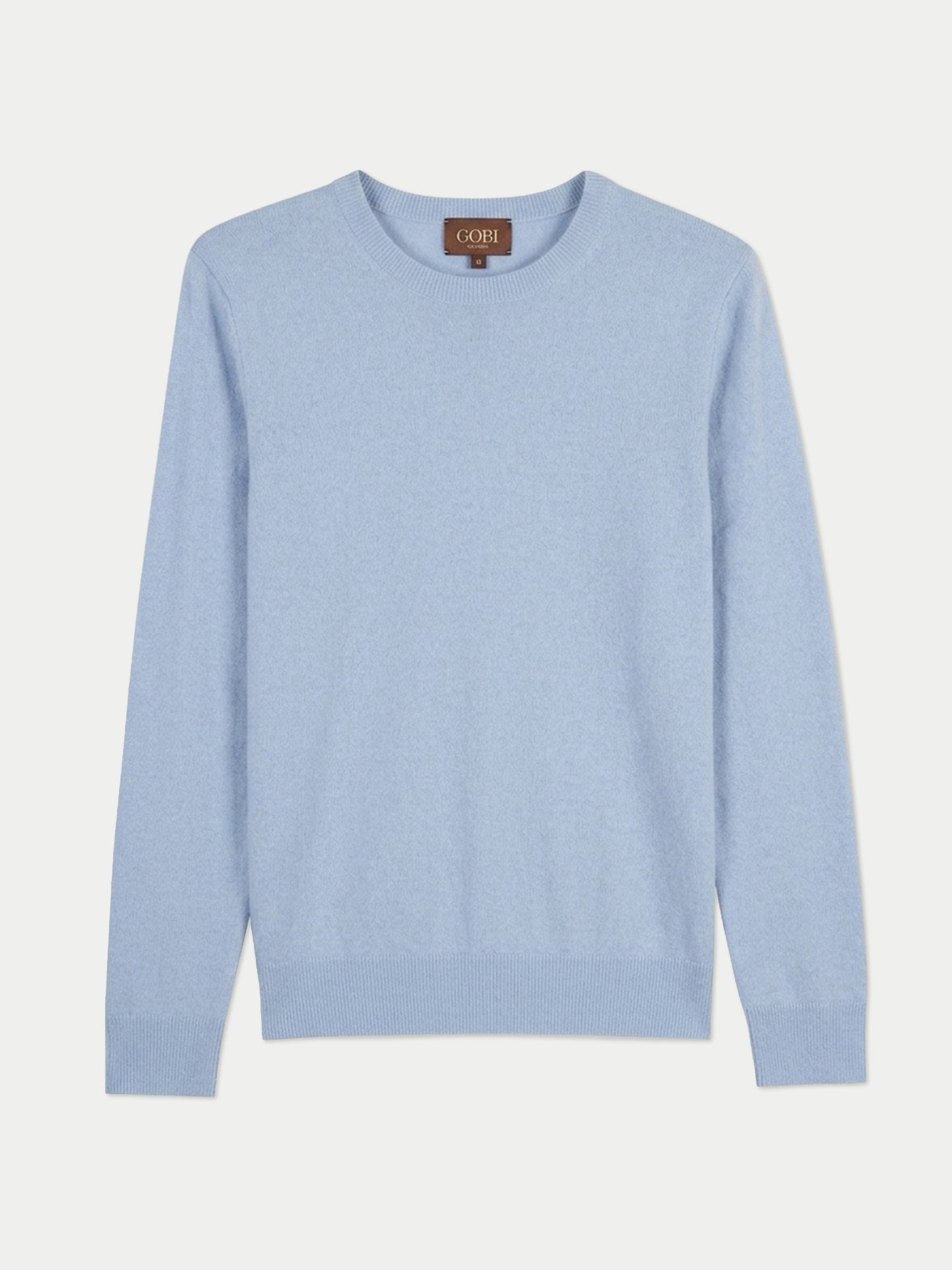 Vue de face d'un pull bleu clair à col rond sur fond gris clair. #color_bleu-clair