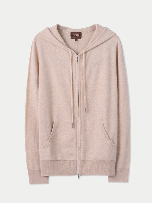 Vue de face d'un sweat à capuche beige à poches latérales sur fond gris clair. #color_beige